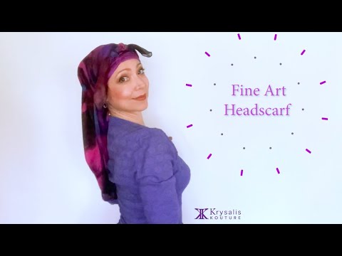 A woman in a magenta blouse shows us how to wear and tie the exquisite Krysalis Kouture Fine Art Headscarf. It can be styled and worn in over 20 different ways