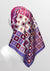 beautiful woman wearing a fashionable headscarf, of pink and lavender with geometric shapes , in the retro kerchief style, designed specifically for those experiencing hair loss