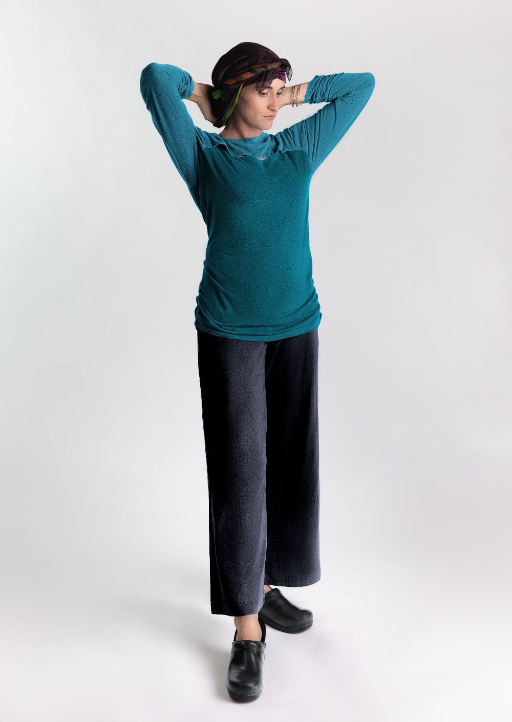 Fashionable woman in medically accessible adaptive clothing.