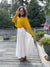 Woman in sun safe upf 50+ hoodie for travel , with extra large hood and glovelettes for hand protection,